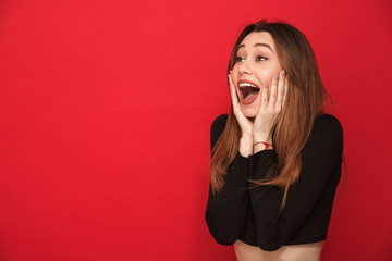 Canvas Print - Happy screaming surprised young woman