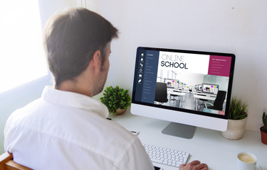 Poster - man browsing online school on computer