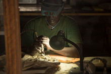African Paleontologist At Work