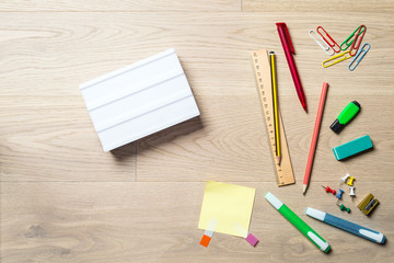 Wall Mural - Blank lightbox with copy space on desk from above