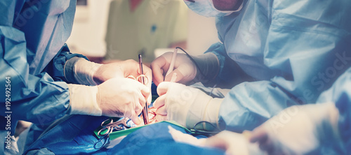 Fotomural Medical team of surgeons in hospital doing minimal invasive surgical interventions