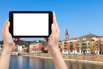 Wall Mural - tourist photographs waterfront in Verona town