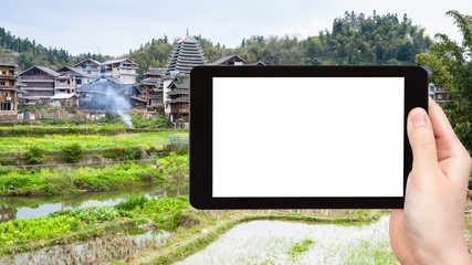 Wall Mural - tourist photographs rice fields in Chengyang