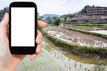 Canvas Print - tourist photographs rice fields in Chengyang