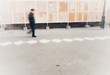 © robypangy - isolated blurry person walks in town