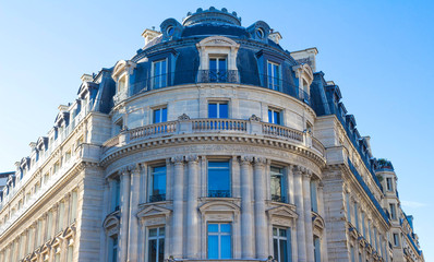 The traditional facade of Parisian building, France.