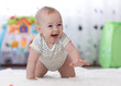 © Oksana Kuzmina - crawling funny baby boy in nursery at home