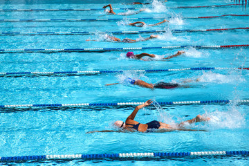 Swimming in the pool.