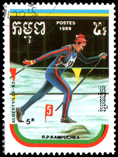 Poster REPUBLIC OF KAMPUCHEA (CAMBODIA) - CIRCA 1989: postage stamp, printed in Republic of Kampuchea, shows a cross-country skiing