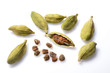 Cardamom pods and cardamom seeds isolate on white background