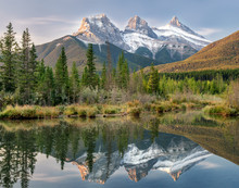 Sunrise Of The Three Sisters And The Bow River From Canmore Near Banff National Park