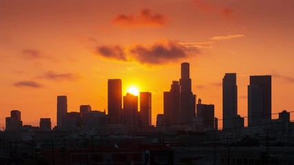 Aufkleber - Beautiful sunset sun behind downtown Los Angeles city skyline. 4K UHD Timelapse