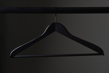 Wall Mural - A black coat hanger and closet rod