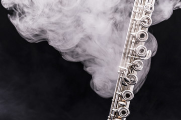 A flute in smoke