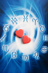Wall Mural - red hearts over blue zodiac like a concept of astrology and love, astrology and relationship