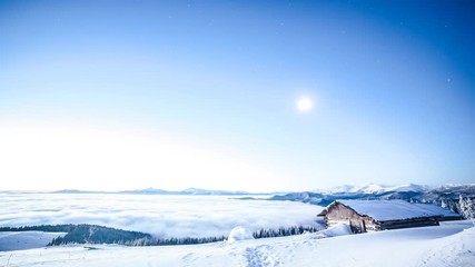 Wall Mural - view at the starry sky and old house on slope. astrophotography.