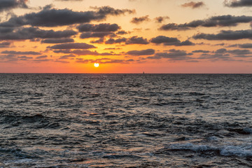 Beautiful sunset at the sea in summer