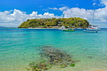Boats Anchoring Near Little Island Off Coast Of Saint Vincent Island, Caribbean Sea Region Of Lesser Antilles