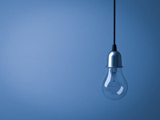 Poster - Hanging Light bulb isolated on dark blue background . 3D rendering.