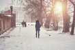 © Alrandir - woman walking in park at winter