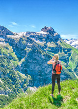Traveler Screams Against The Backdrop Of The Mountain Peaks, The Engelberg Resort, Switzerland