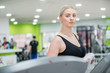 © Senad - Beautiful woman in the gym exercise yoga fitness