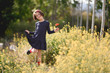 © javiindy - Little girl walking in nature field wearing beautiful dress