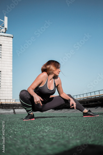 Young Sportive Woman Doing Deep Lunges On The Roof Beautiful Girl Doing Workout Oudoors Buy This Stock Illustration And Explore Similar Illustrations At Adobe Stock Adobe Stock adobe stock