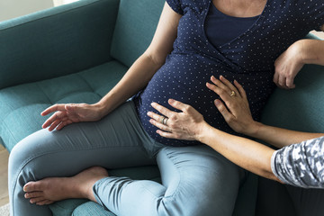 Wall Mural - Pregnant support group meetup in a house