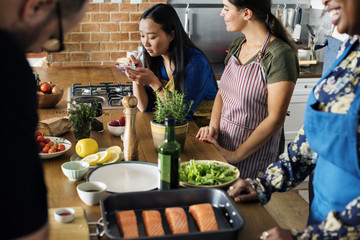 Diverse people joining cooking class