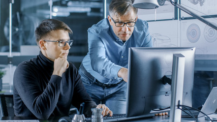 Aufkleber - Experienced Senior Engineer Consults Young Designer about Project, They Have Discussion and Work on a Personal Computer.