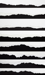 Wall Mural - set of torn paper edges isolated on black