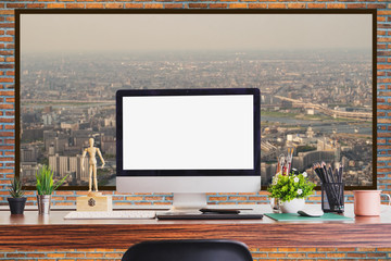 Comfortable workplace with modern desktop computer. Blank screen for graphic display montage.