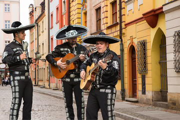 Mexican musicians mariachi on a city street