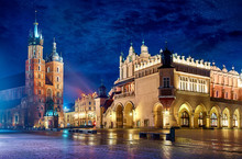 Saint Mary's Basilica In Krakow Poland With Cloth Hall At Main