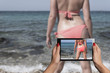 © grufnar - tablet taking photographs that look better than reality of a sexy woman on a beach