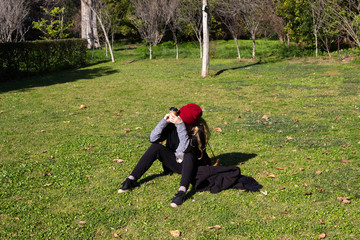 A young woman enjoying a sunny day at a park