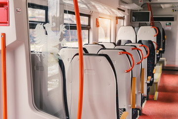 Wall Mural - Inside the car of a new passenger long-distance high-speed train.The coat of arms depicts the coat of arms of Poland