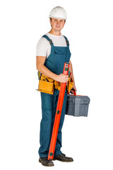 Wall Mural - construction worker in a helmet with toolbox and looking at camera over white background. repair, construction, building, people and maintenance concept.