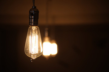 Lamps with tungsten filament. Edison's light bulb. Filament fila