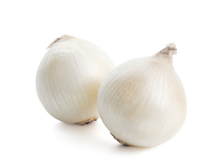 Fresh ripe onions on white background