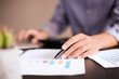© Africa Studio - Man working at table in office, closeup. Financial trading concept