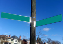 My Neighborhood Intersection. Street Signs  With Blue Sky.