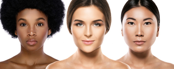 Wall Mural - different ethnicity women - caucasian, african, asian.