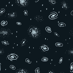 Vector seamless hand drawn galaxy background from spiral, elliptical, lenticular and irregular nebula. Space backdrop