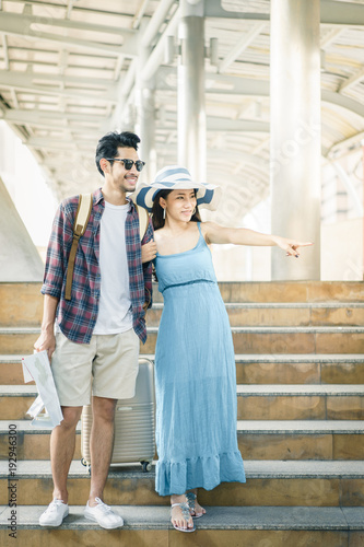 Young Couple Walking Arm In Arm And Pointing Fingers And Looking Something Couple Love Valentine Travel And Fashion In Summer Concepts Stock Photo Adobe Stock Young Couple Walking Arm In Arm And Pointing Fingers And Looking Something Couple Love Valentine Travel And Fashion In Summer Concepts Stock Photo Adobe Stock