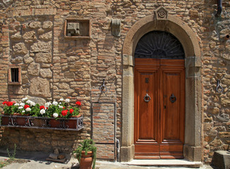 Canvas Print - Wooden door in old Italian house, Tuscany, Italy