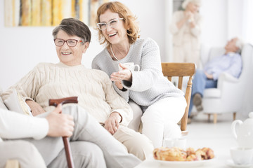 Wall Mural - Smiling senior women have fun