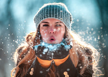 Winter Woman Blowing Snow Outdoor At Sunny Day, Flying Snowflakes