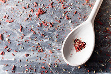 Red Chili Seasoning In A Valentine Composition.
